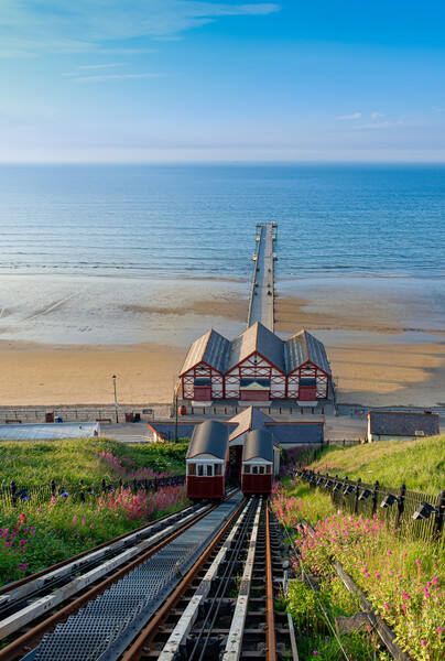 Saltburn cliff lift and pier Picture Board by Kevin Winter