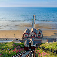 Buy canvas prints of Saltburn cliff lift and pier by Kevin Winter