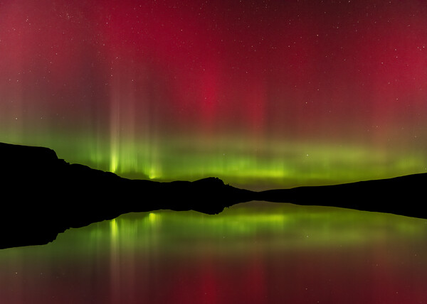 The Northern Lights reflected in Loch Fada Picture Board by Kevin Winter