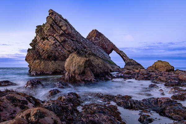 Crashing tide at Bow fiddle rock Picture Board by Kevin Winter