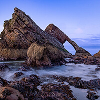 Buy canvas prints of Crashing tide at Bow fiddle rock by Kevin Winter