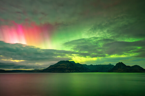 Northern lights over elgol Picture Board by Kevin Winter