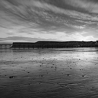 Buy canvas prints of sunrise over Saltburn beach in Black and white by Kevin Winter