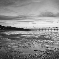 Buy canvas prints of Sunset over Saltburn beach in Black and white by Kevin Winter