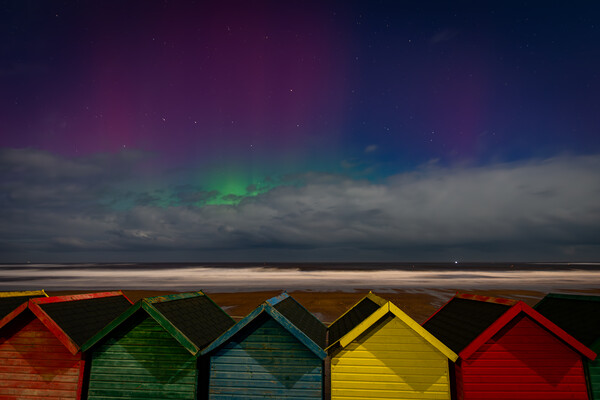 Aurora beach huts Picture Board by Kevin Winter