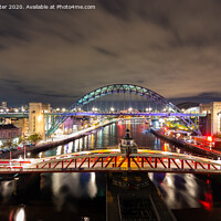 Buy canvas prints of Swing and Tyne bridges by Kevin Winter