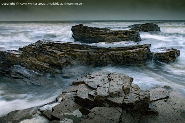 Rocks in Marsden Bay Picture Board by Kevin Winter