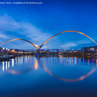Buy canvas prints of Tranquil Reflections of the Infinity Bridge by Kevin Winter