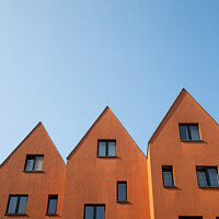 Buy canvas prints of Orange brown building in Germany by Sanga Park