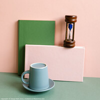 Buy canvas prints of Notebook sandglass coffee cup on desk by Sanga Park
