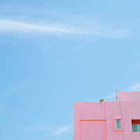 Buy canvas prints of Pink minimal building with blue sky by Sanga Park