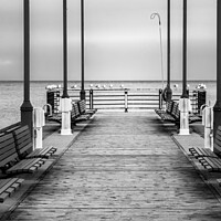 Buy canvas prints of Lake Pier - A deserted tranquil boardwalk, black & white. by Blok Photo 