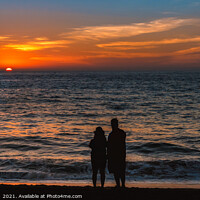 Buy canvas prints of Remember when - a couple in silhouette share a moment, sand, sea and setting sun by Blok Photo 