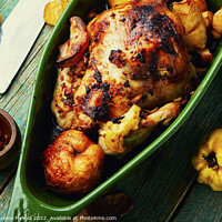 Buy canvas prints of Whole chicken roasted with autumn quince by Mykola Lunov Mykola