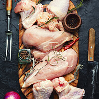 Buy canvas prints of Assortment chicken parts for cooking. by Mykola Lunov Mykola