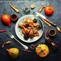 Buy canvas prints of Baked chicken drumsticks with pumpkin by Mykola Lunov Mykola