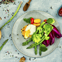 Buy canvas prints of Fresh salad of asparagus, lettuce and poached eggs. by Mykola Lunov Mykola