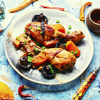 Buy canvas prints of Chicken drumsticks roasted with vegetable. by Mykola Lunov Mykola