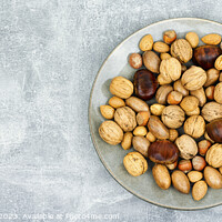Buy canvas prints of Mixed nuts, space for text by Mykola Lunov Mykola