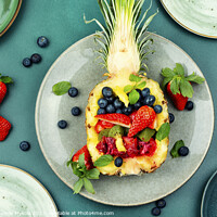 Buy canvas prints of Fruit salad in half a pineapple. by Mykola Lunov Mykola