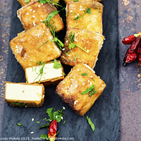 Buy canvas prints of Yummy tofu cheese roasted with sesame by Mykola Lunov Mykola