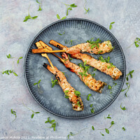 Buy canvas prints of Shrimps prawns skewers with herbs by Mykola Lunov Mykola