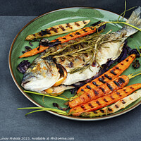Buy canvas prints of Roasted dorado fish on a plate by Mykola Lunov Mykola