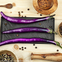 Buy canvas prints of Small raw purple eggplants by Mykola Lunov Mykola