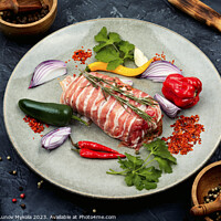 Buy canvas prints of Fresh raw bacon wrapped meat roll chicken. by Mykola Lunov Mykola