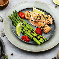 Buy canvas prints of Salmon cooked with asparagus. by Mykola Lunov Mykola