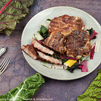 Buy canvas prints of Meat steak with green salad. by Mykola Lunov Mykola