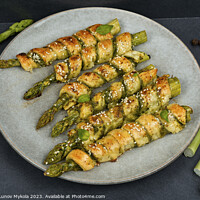 Buy canvas prints of Green asparagus baked in dough. by Mykola Lunov Mykola