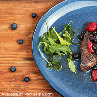 Buy canvas prints of Beef steak in berry sauce on plate. by Mykola Lunov Mykola