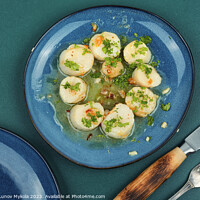 Buy canvas prints of Seared scallops with butter sauce by Mykola Lunov Mykola