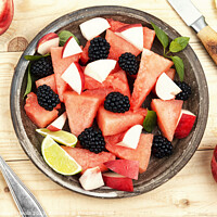 Buy canvas prints of Fruity watermelon salad on a plate. by Mykola Lunov Mykola