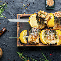 Buy canvas prints of Barbecue mackerel fish on skewers by Mykola Lunov Mykola