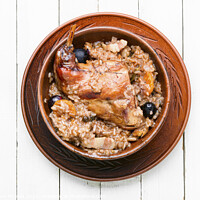 Buy canvas prints of Delicious risotto with rabbit. by Mykola Lunov Mykola