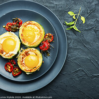 Buy canvas prints of Scrambled eggs on frying pan by Mykola Lunov Mykola