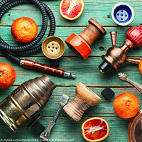 Buy canvas prints of Smoking hookah with grapefruit flavor by Mykola Lunov Mykola