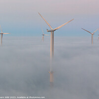Buy canvas prints of Wind turbines above the fog by Northern Wild