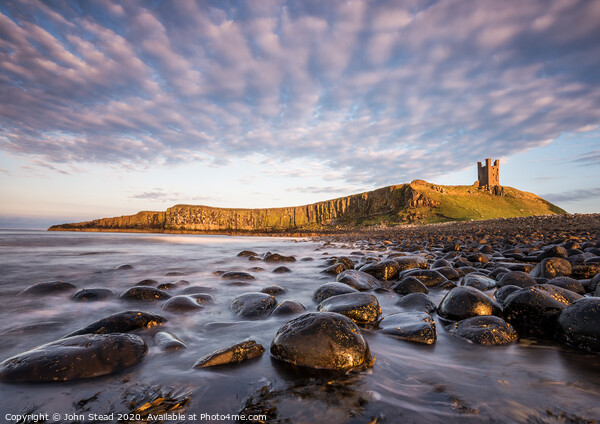 Dunstanburgh Castle clouds Picture Board by Northern Wild