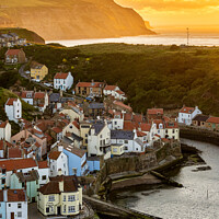 Buy canvas prints of Staithes Village sunset by Northern Wild
