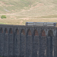 Buy canvas prints of Train Passing over Ribblesdail Viaduct by chris hyde