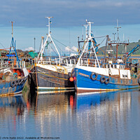 Buy canvas prints of Trawlers docked in Campbeltown  by chris hyde