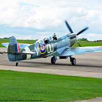 Buy canvas prints of Two Seater Spitfire Taxiing by chris hyde