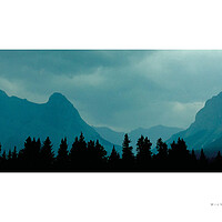 Buy canvas prints of The Rockies Silhouette (Canada) by Michael Angus