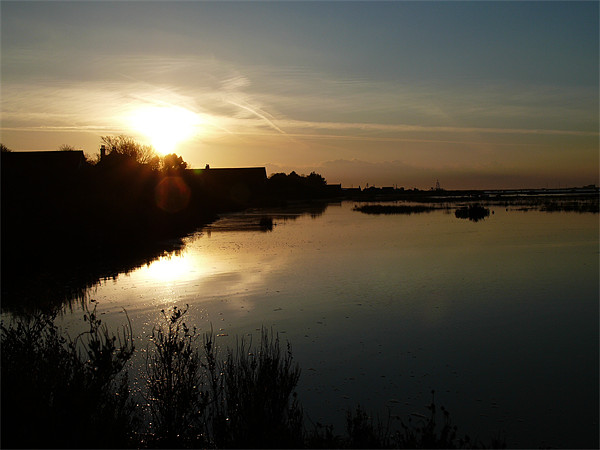 Sunset over Brancaster Staithe Picture Board by David French