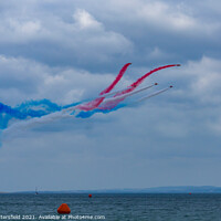Buy canvas prints of Red Arrows display over Bournemouth sea by Julie Tattersfield