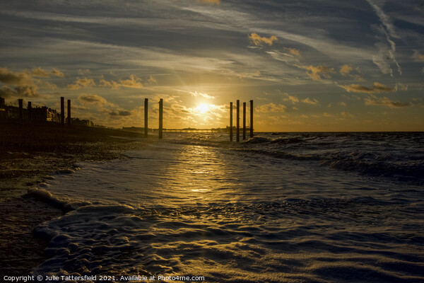 Brighton pier glowing in the sunrise Picture Board by Julie Tattersfield