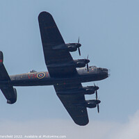 Buy canvas prints of Lancaster Bomber by Julie Tattersfield